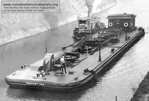 A typical 1920s Standard Oil Company barge that may have delivered oil to Macedon.
