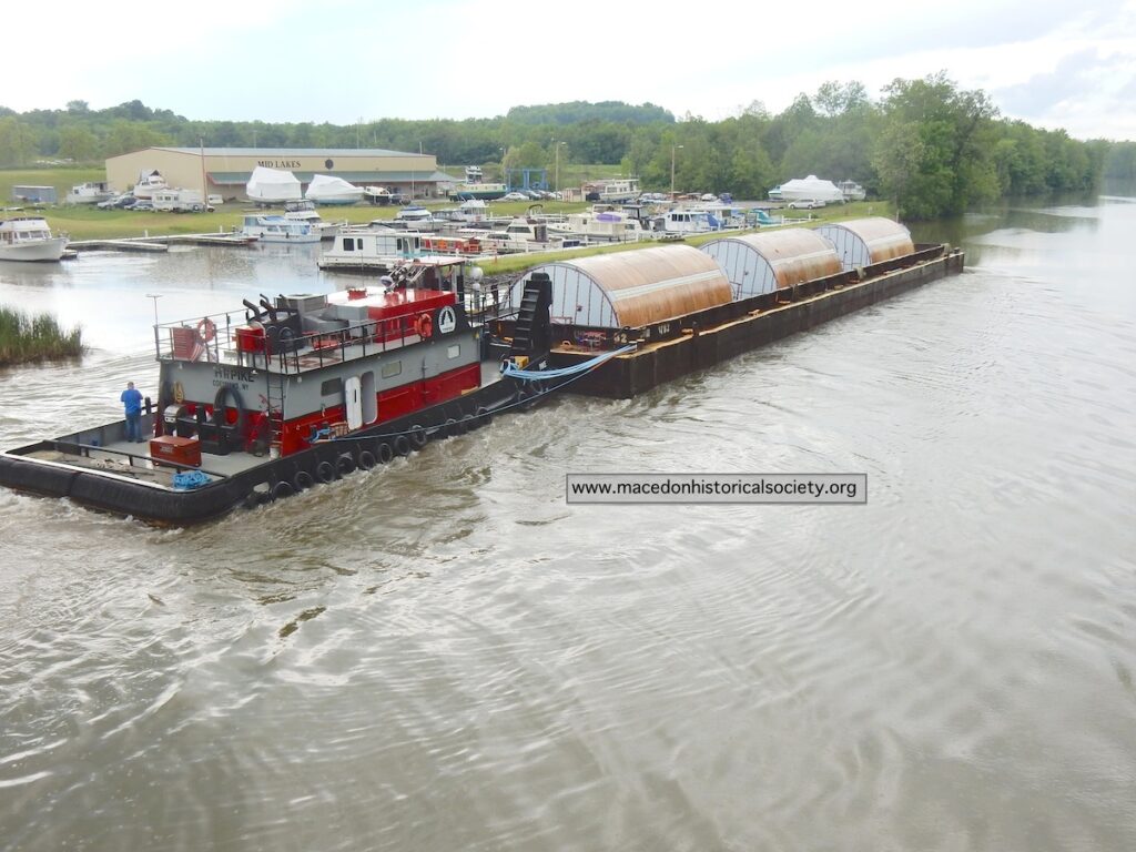 Three tanks passing Mid-Lakes Marina.